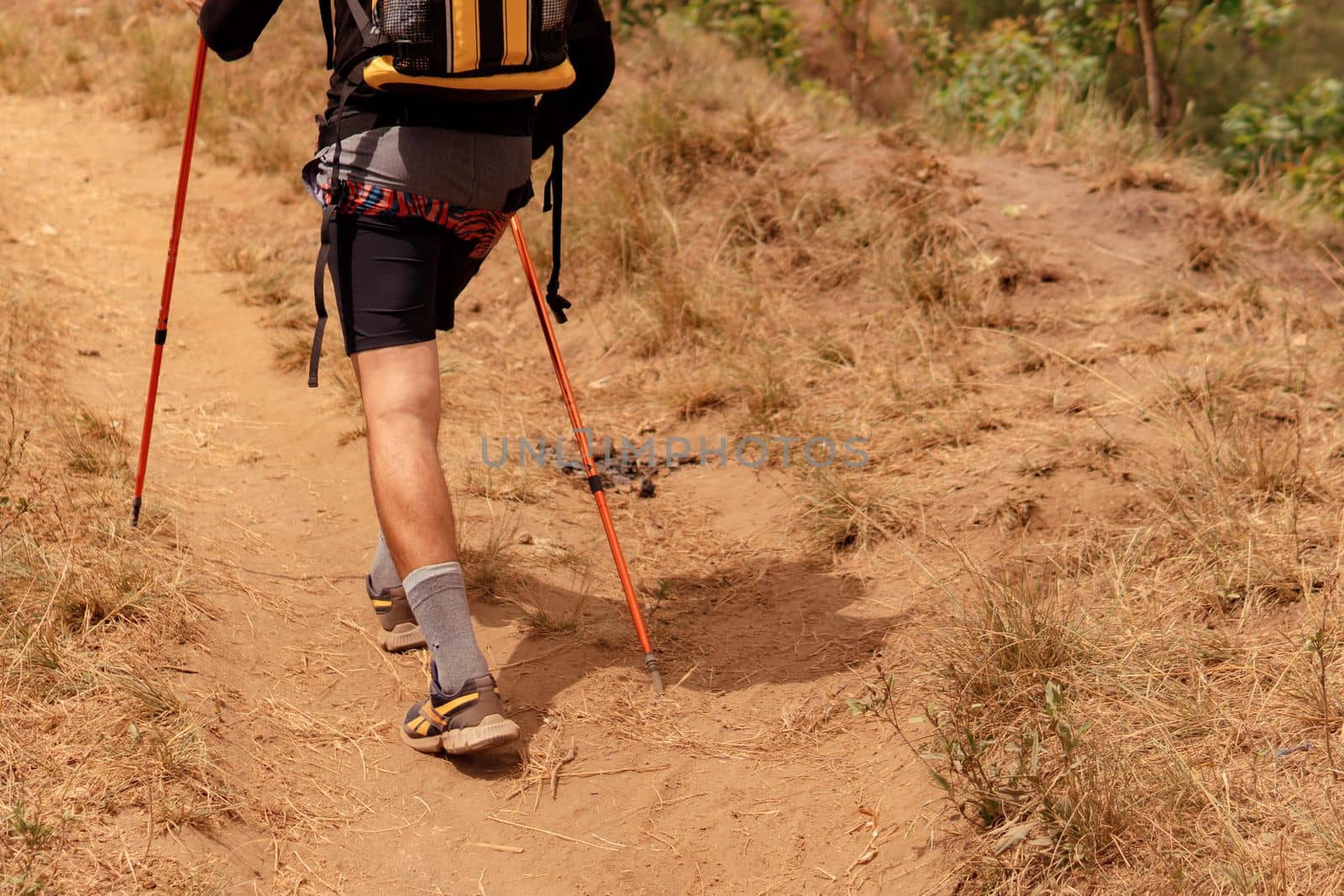 a man walks trekking in the mountains. bali