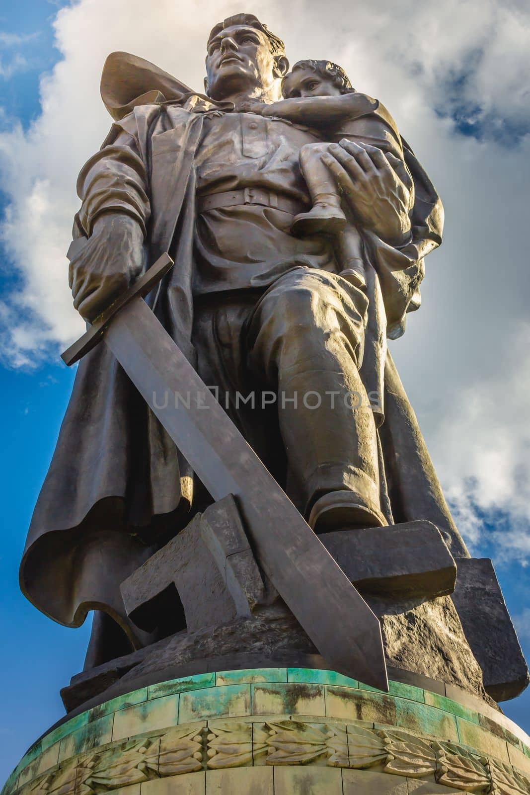 Statue of the heroic Soldier Liberator in Soviet War Memorial at sunset, Berlin, Germany