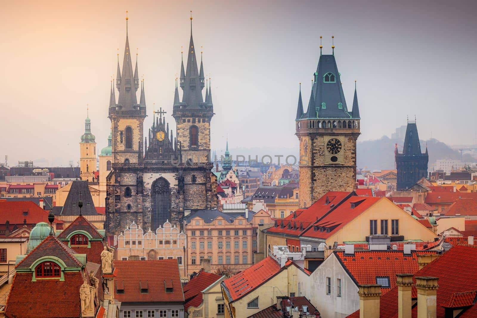 Panoramic view over the cityscape of Prague roofs at dramatic sunset, Czech Republic