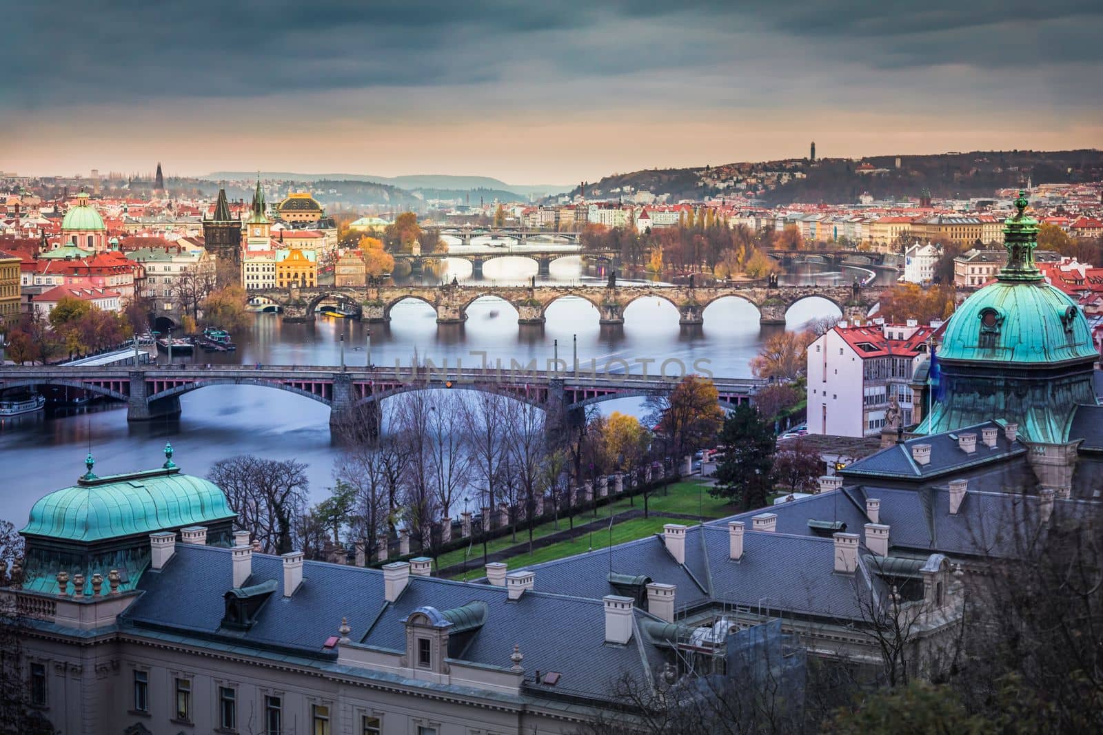 Panoramic view over the cityscape of Prague at dramatic dusk, Czech Republic by positivetravelart