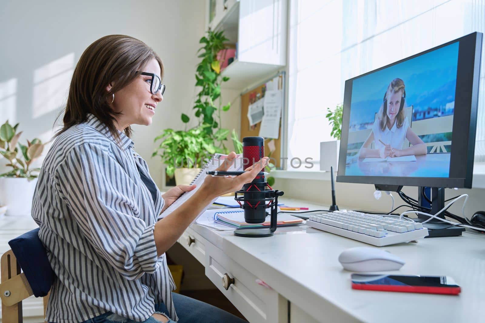 Online lesson, woman teacher teaching child girl by VH-studio