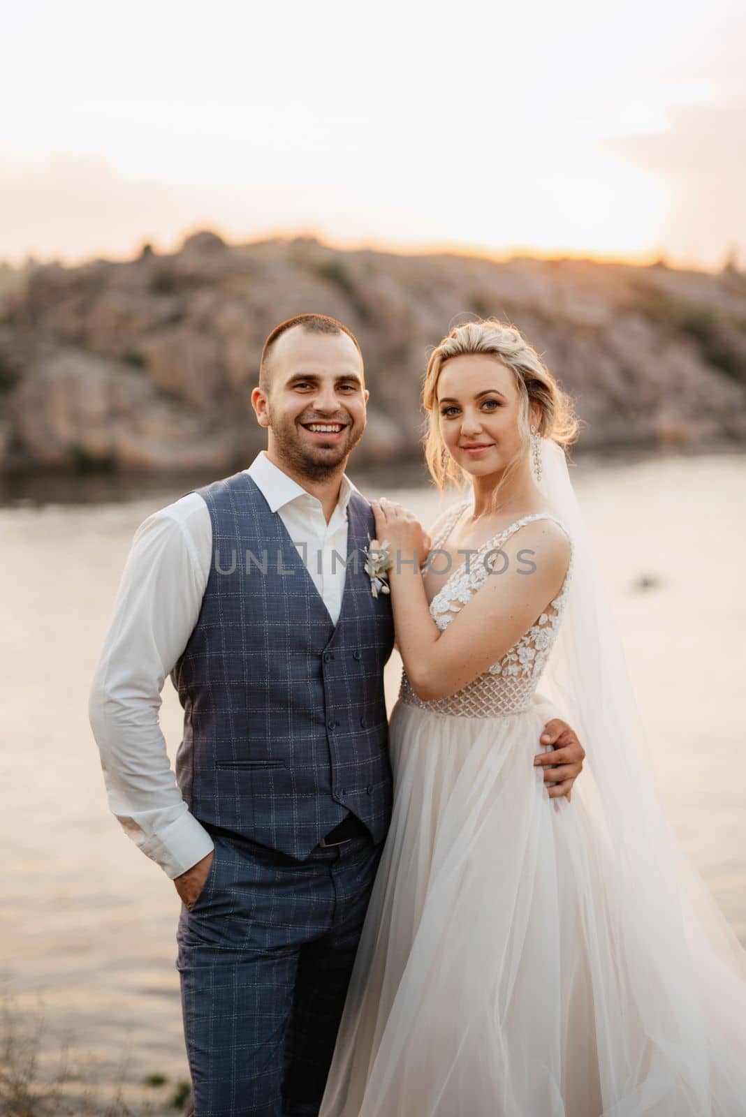 bride blonde girl and groom near the river by Andreua