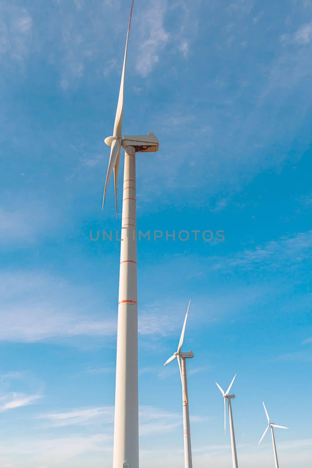 Green energy on wind turbines and wind turbines. Alternative energy sources and renewable energy sources. Power generation and generators of power plants.Wind farm and wind,environmental conservation