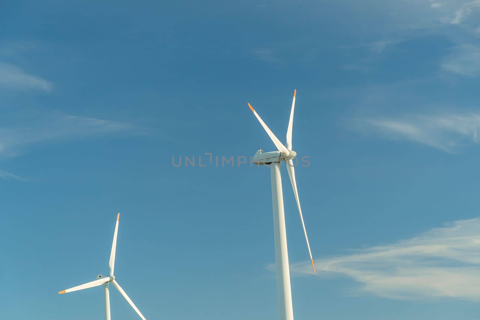 Green energy on wind turbines and wind turbines. Alternative energy sources and renewable energy sources. Power generation and generators of power plants.Wind farm and wind,environmental conservation by YevgeniySam