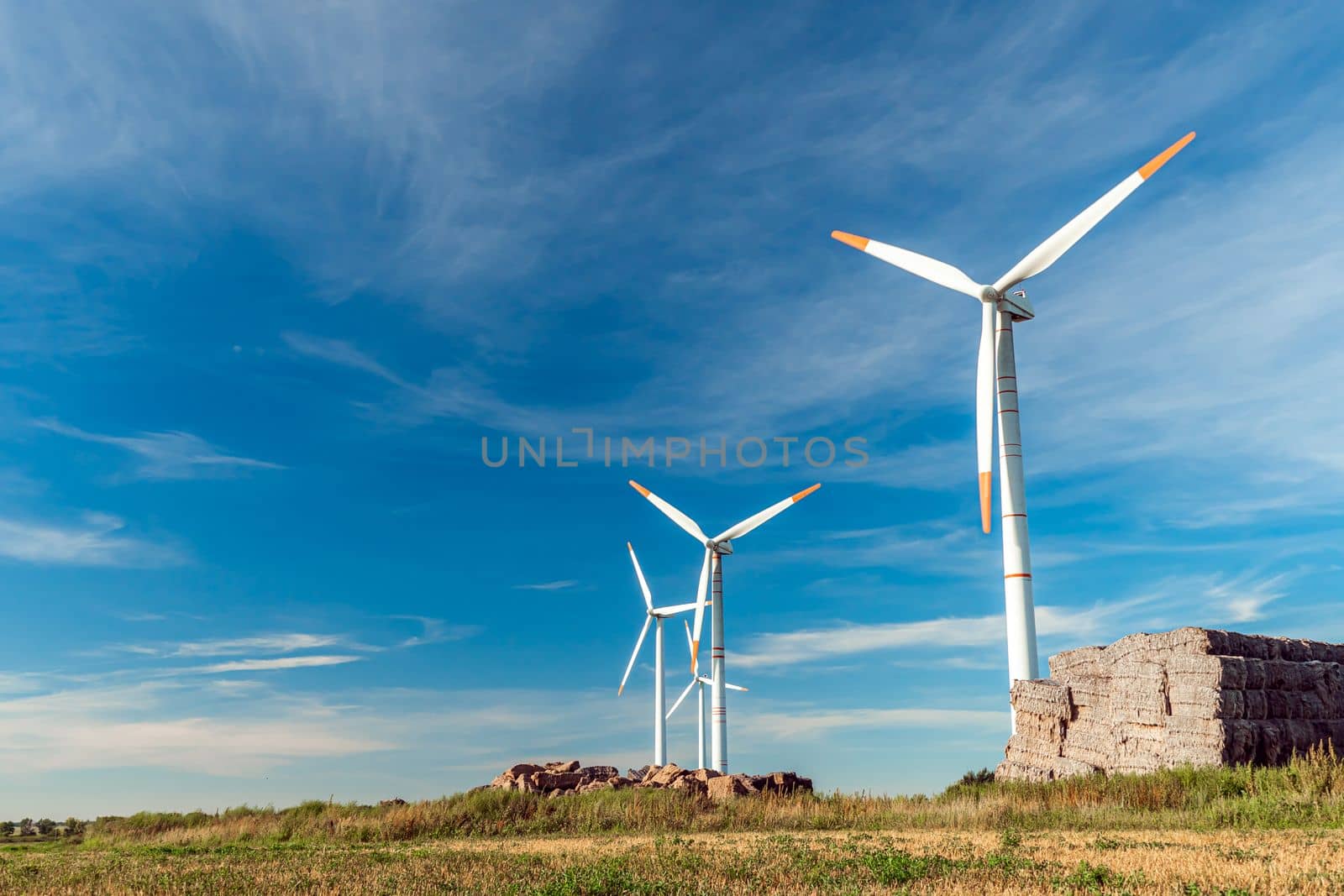 Green energy on wind turbines and wind turbines. Alternative energy sources and renewable energy sources. Power generation and generators of power plants.Wind farm and wind,environmental conservation by YevgeniySam