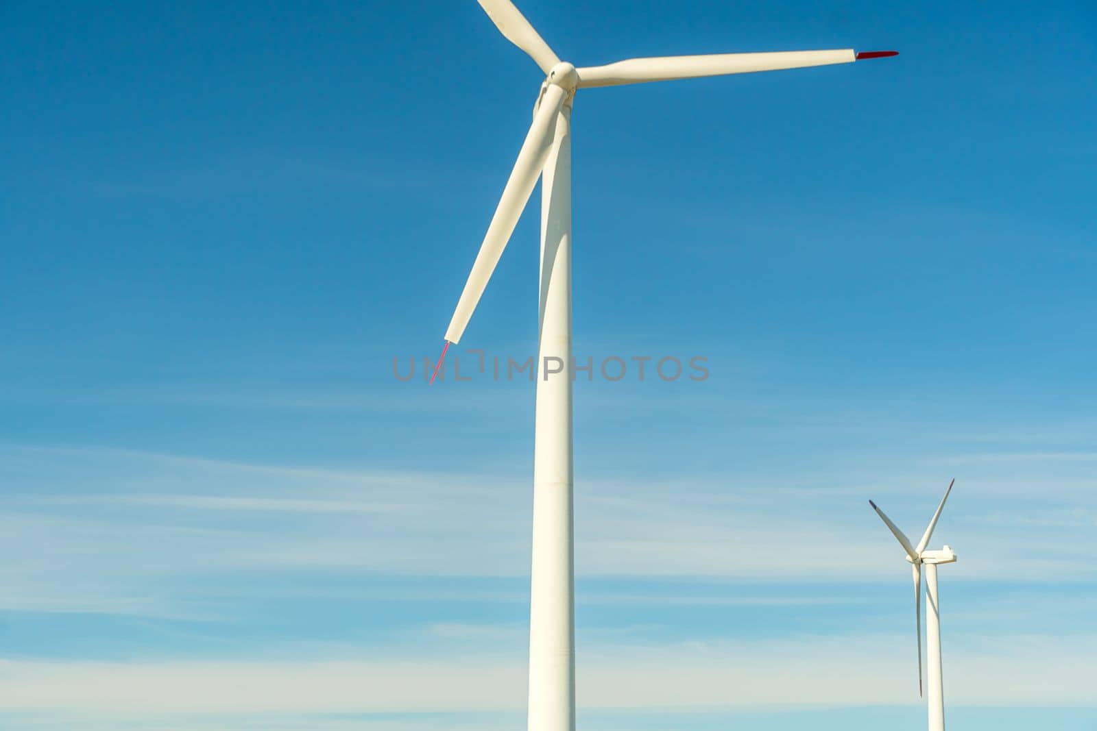 Green energy on wind turbines and wind turbines. Alternative energy sources and renewable energy sources. Power generation and generators of power plants.Wind farm and wind,environmental conservation by YevgeniySam