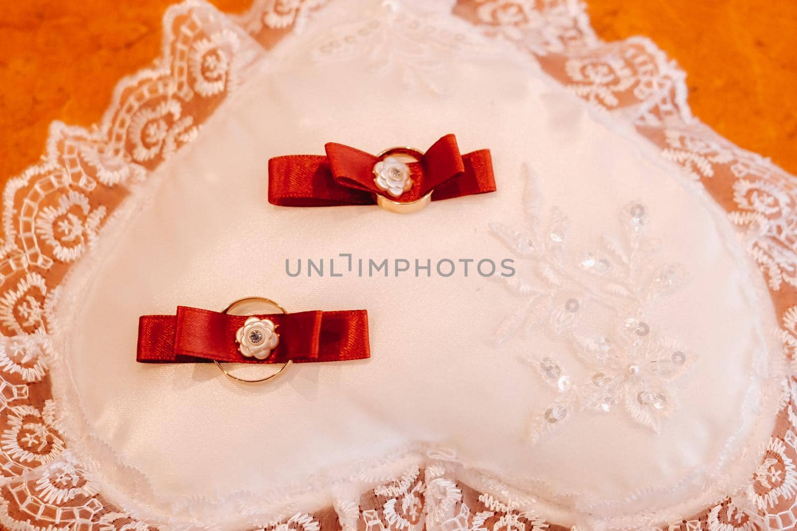 Close-up of two gold wedding rings for a wedding.