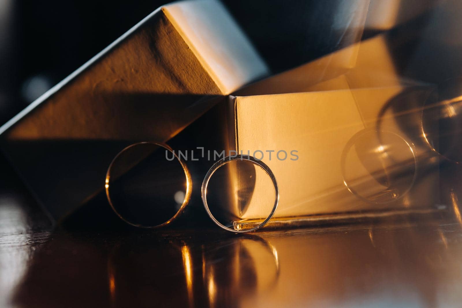 Close-up of two gold wedding rings for a wedding.