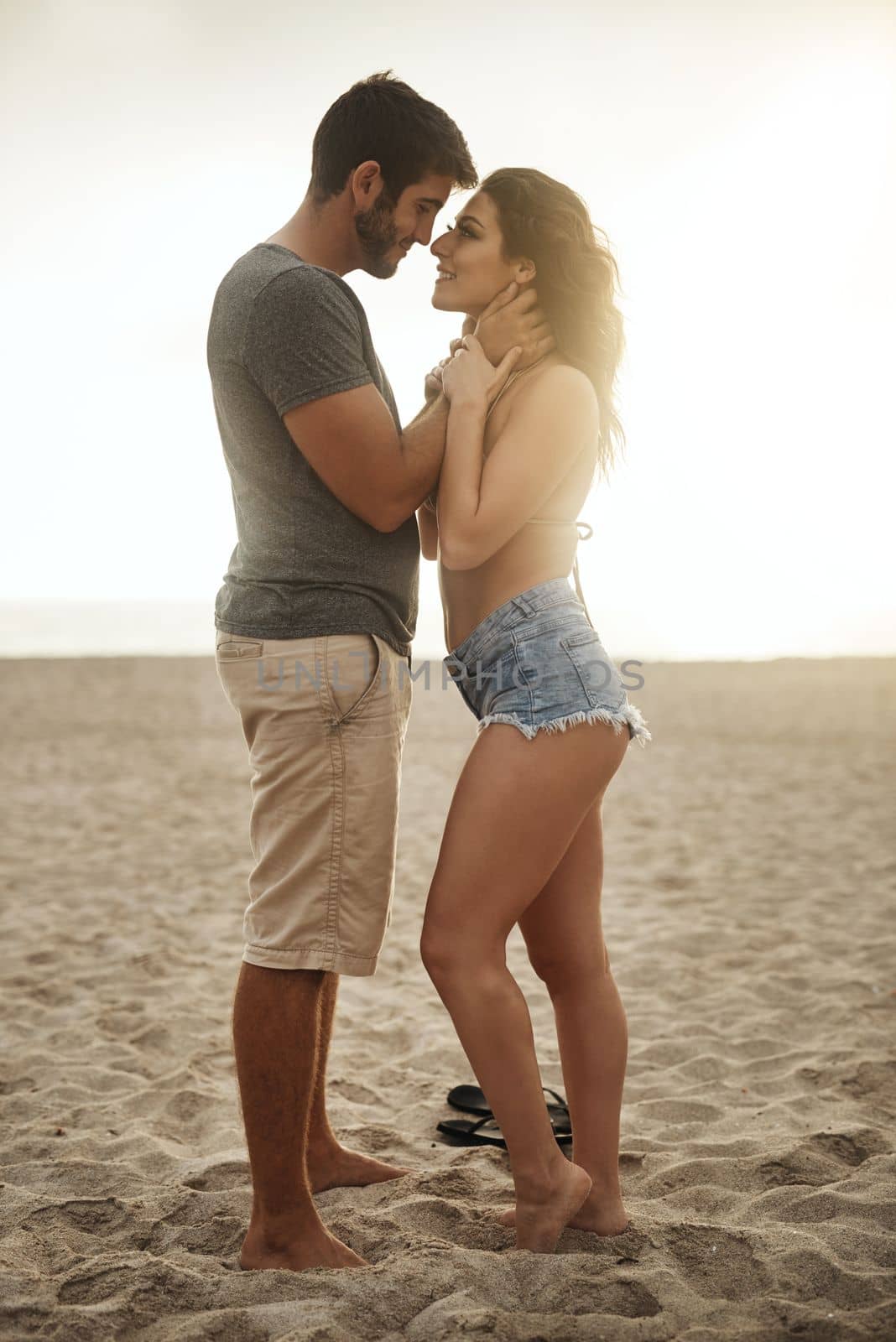 I could spend an eternity loving you. a young couple spending a romantic day at the beach