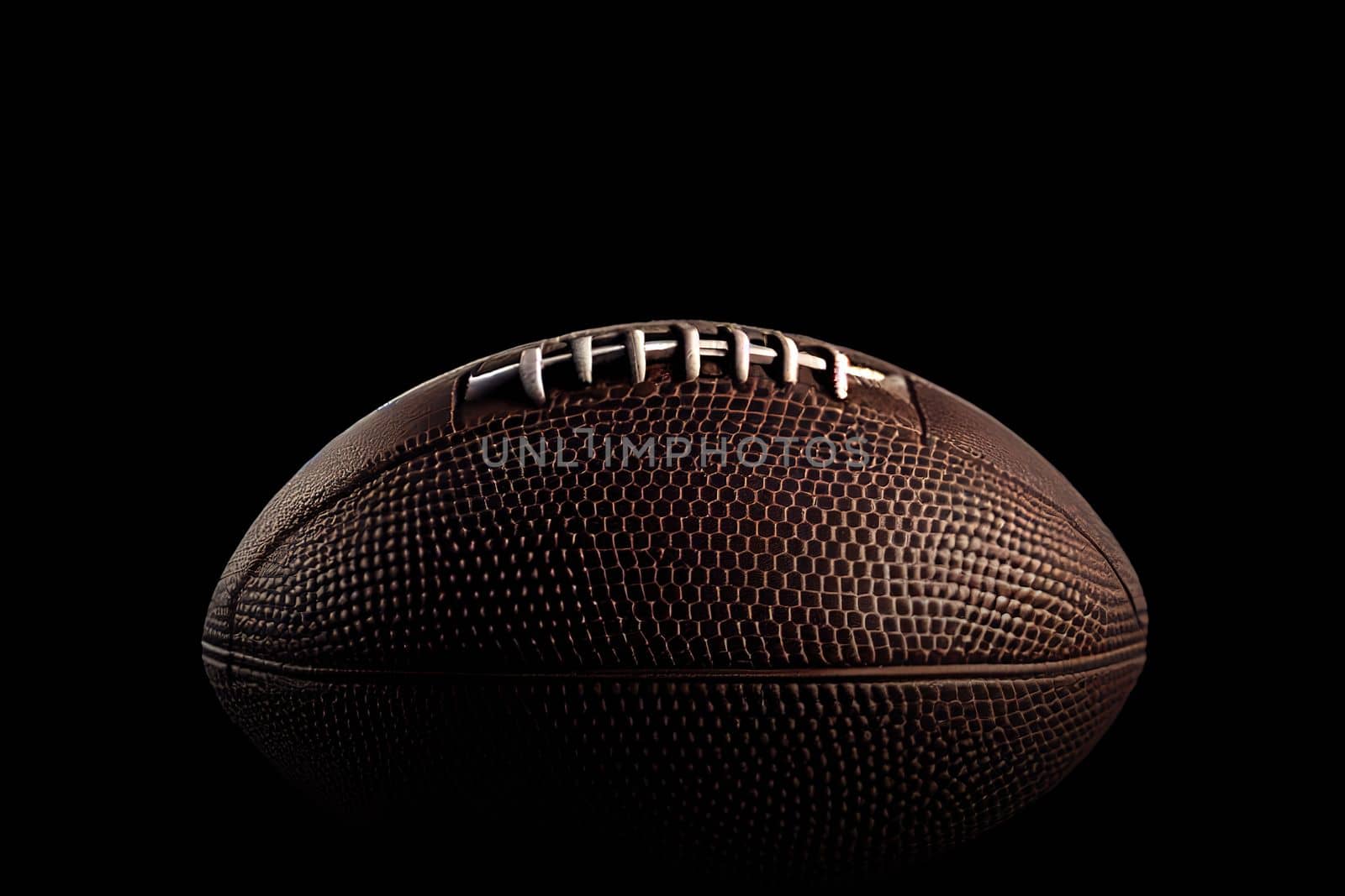 Close up of an American football on dark background. Super bowl. Wallpaper