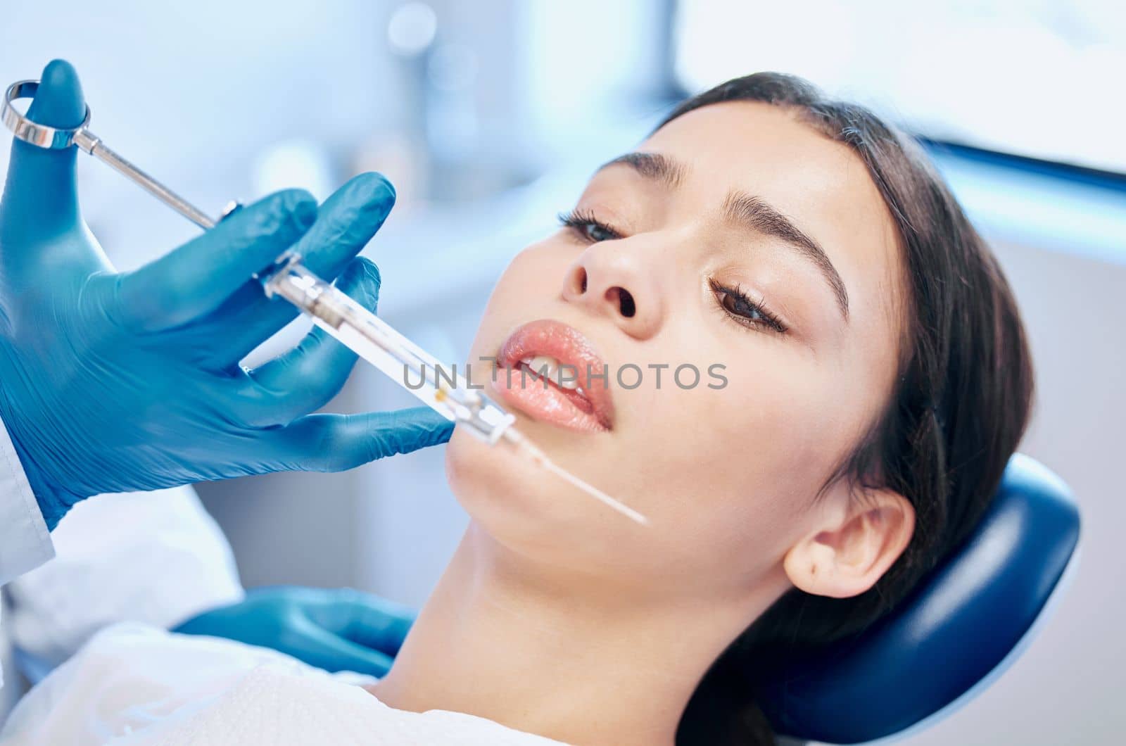 That is one big needle. a dental patient about to receive an injection