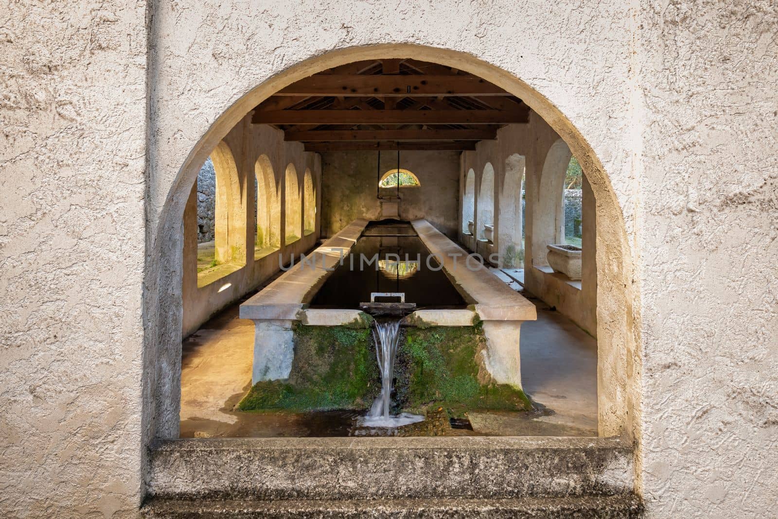 View of the washhouse in the small town of Mazaugues in the Var department, located at the eastern end of the Sainte-Baume massif, in the Provence region of France