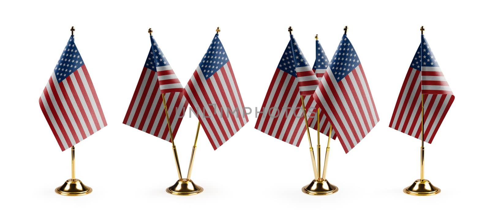 Small national flags of the USA on a white background by butenkow