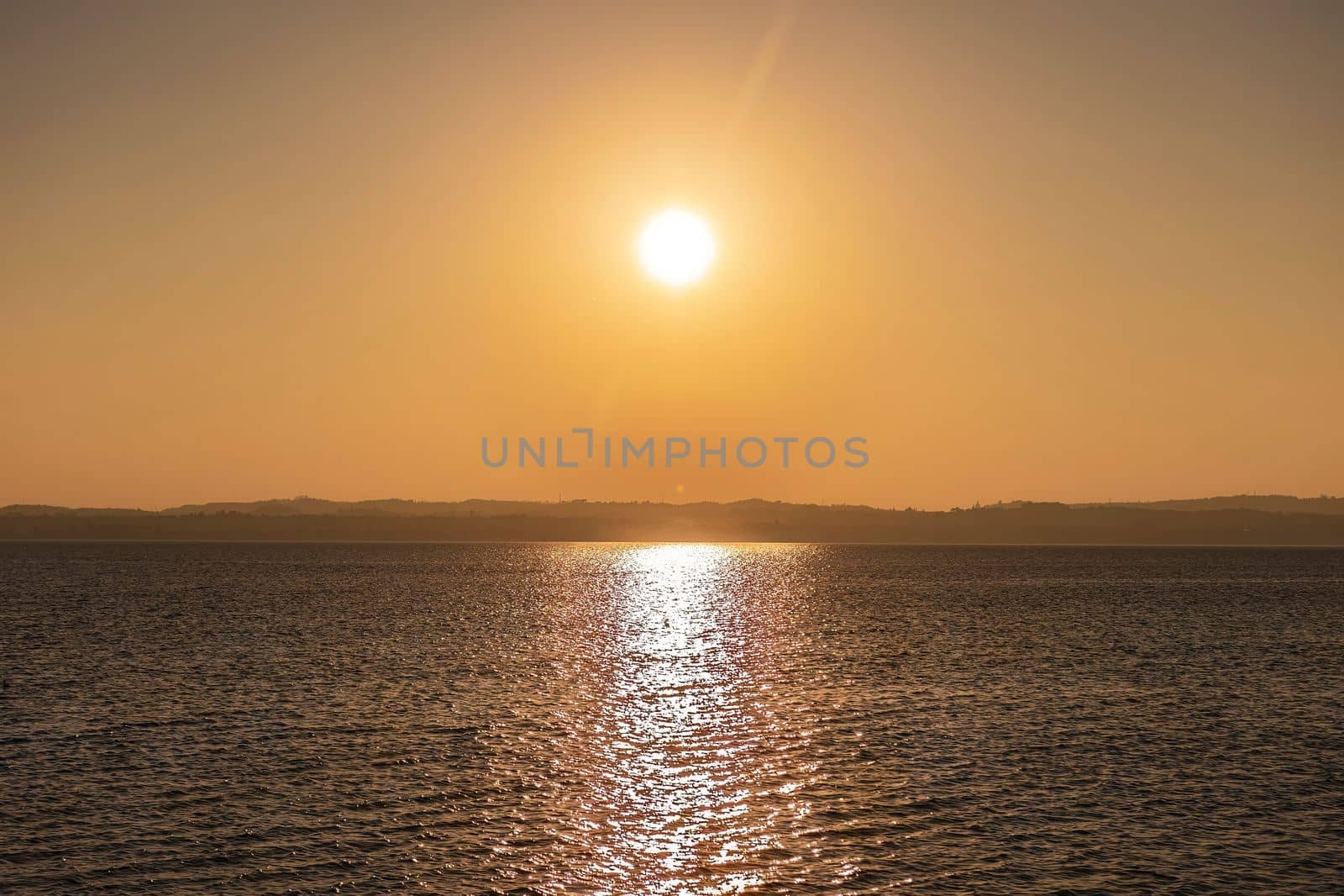 Golden Sunset at Garda Lake by pippocarlot
