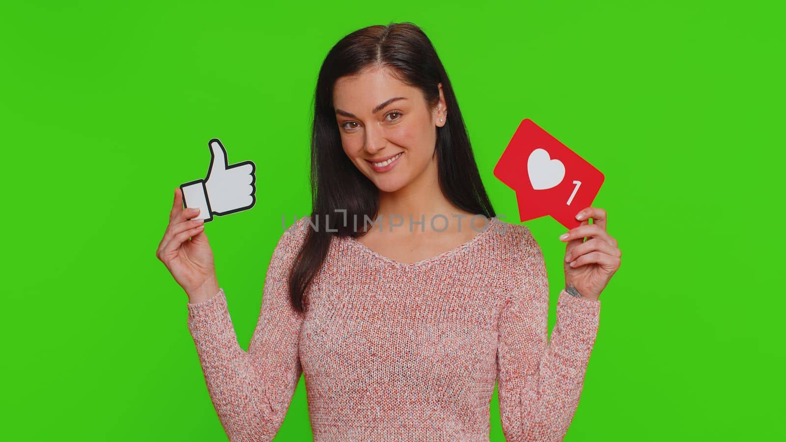 Like. Lovely woman raises inscription thumbs up banner thumbs up agrees with something, gives positive reply recommends advertisement likes good on social media. Young girl on chroma key background