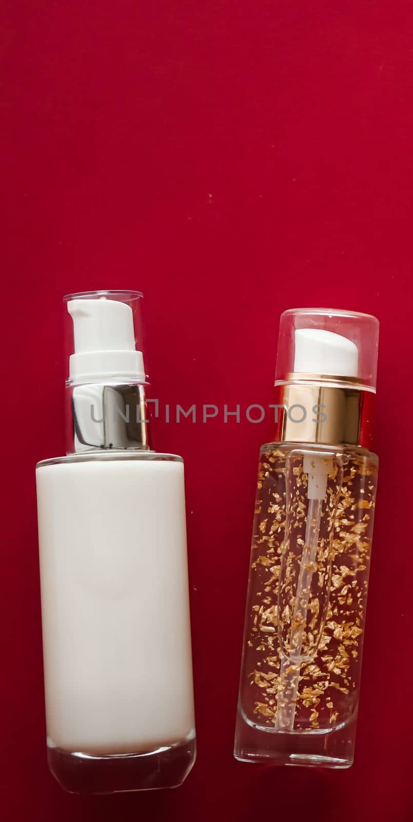 Beauty cosmetics and skincare product on red background, flatlay.