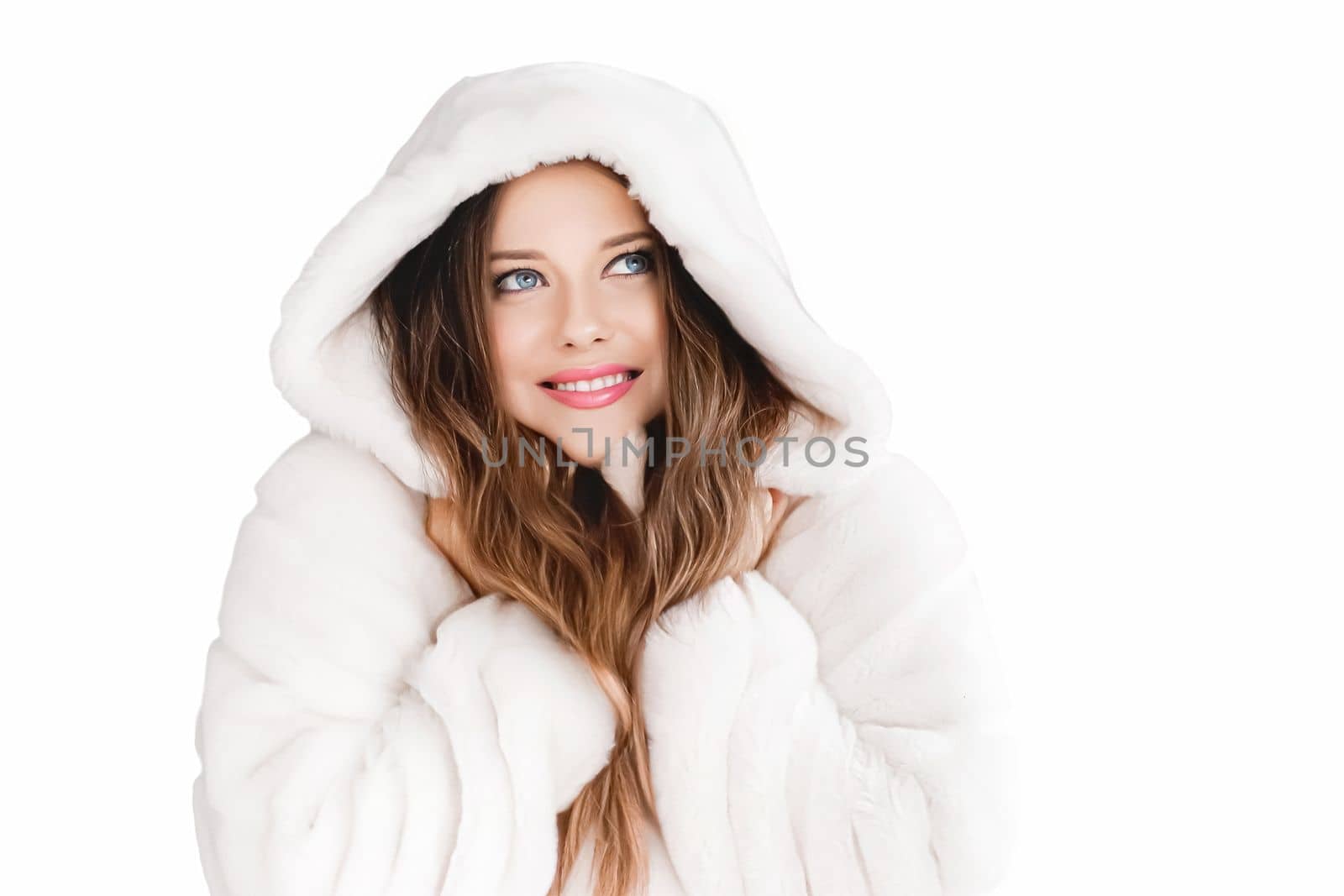 Winter fashion and beauty, beautiful woman in white fur coat.