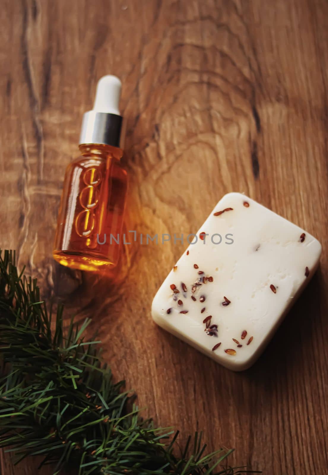 Oil serum bottle and natural herbal handmade soap, beauty and skincare product by Anneleven