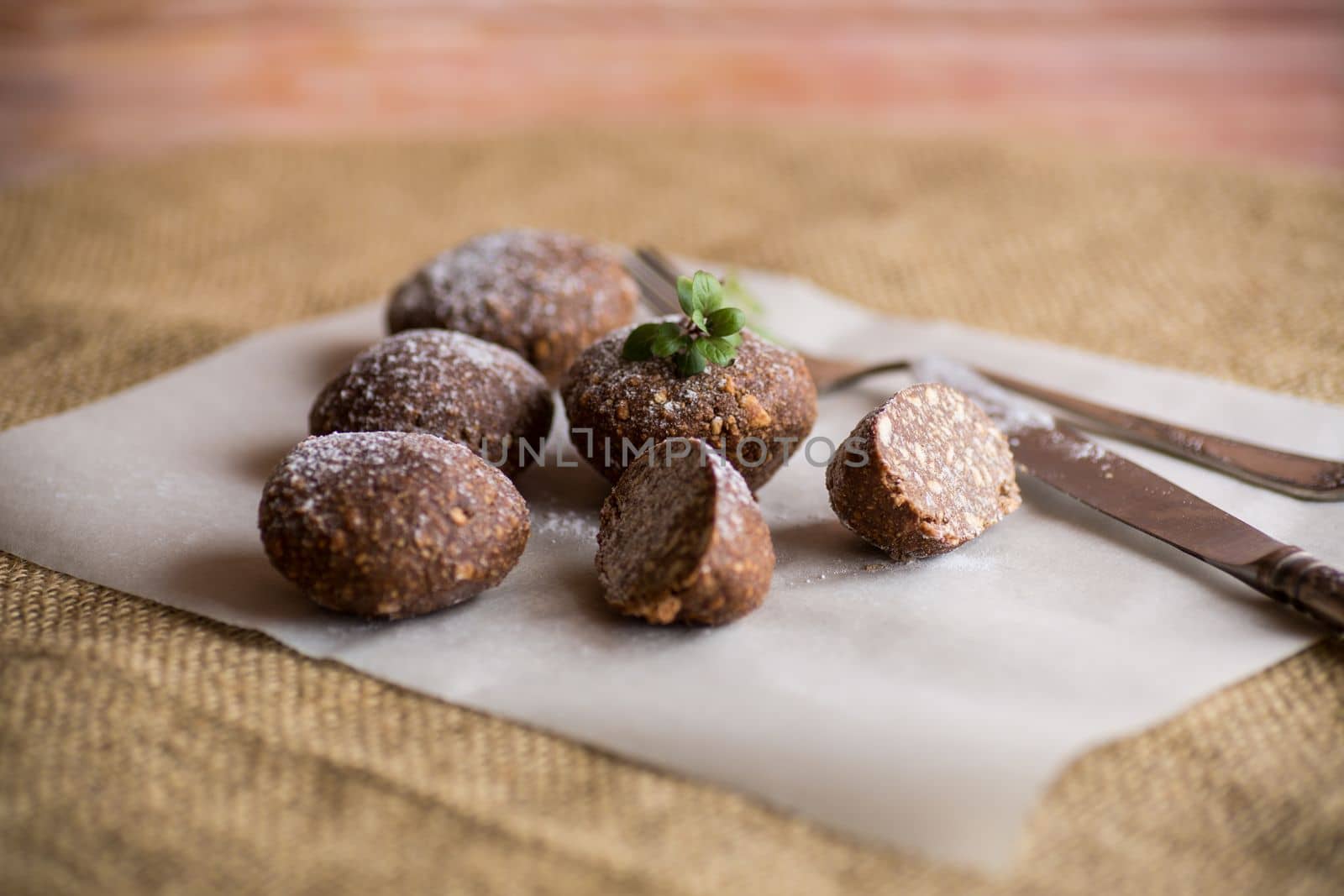 chocolate sweet cakes made from pureed cookies with additives, on baking paper.