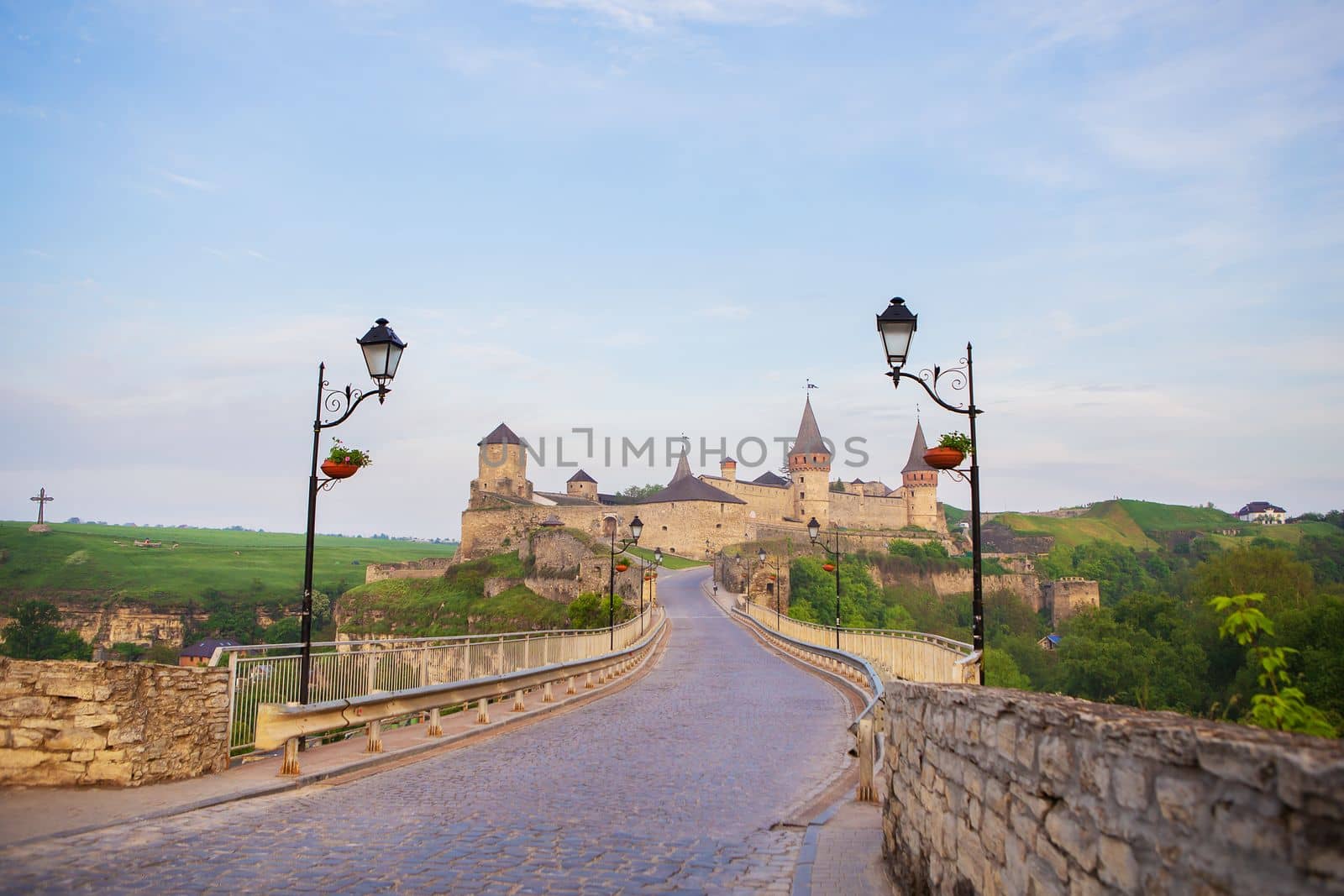 Kamianets-Podilskyi is a romantic city. A picturesque summer view of the ancient castle-fortress in Kamianets-Podilskyi, Khmelnytskyi region, Ukraine. by sfinks