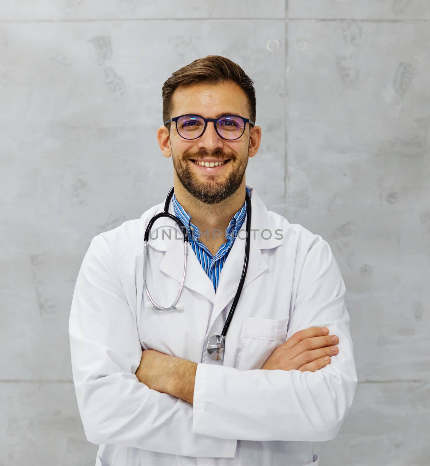 young doctor hospital medical medicine health care clinic office portrait glasses man stethoscope specialist by Picsfive