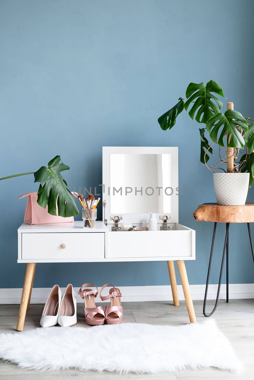 Stylish room interior with elegant dressing table and plants by Desperada