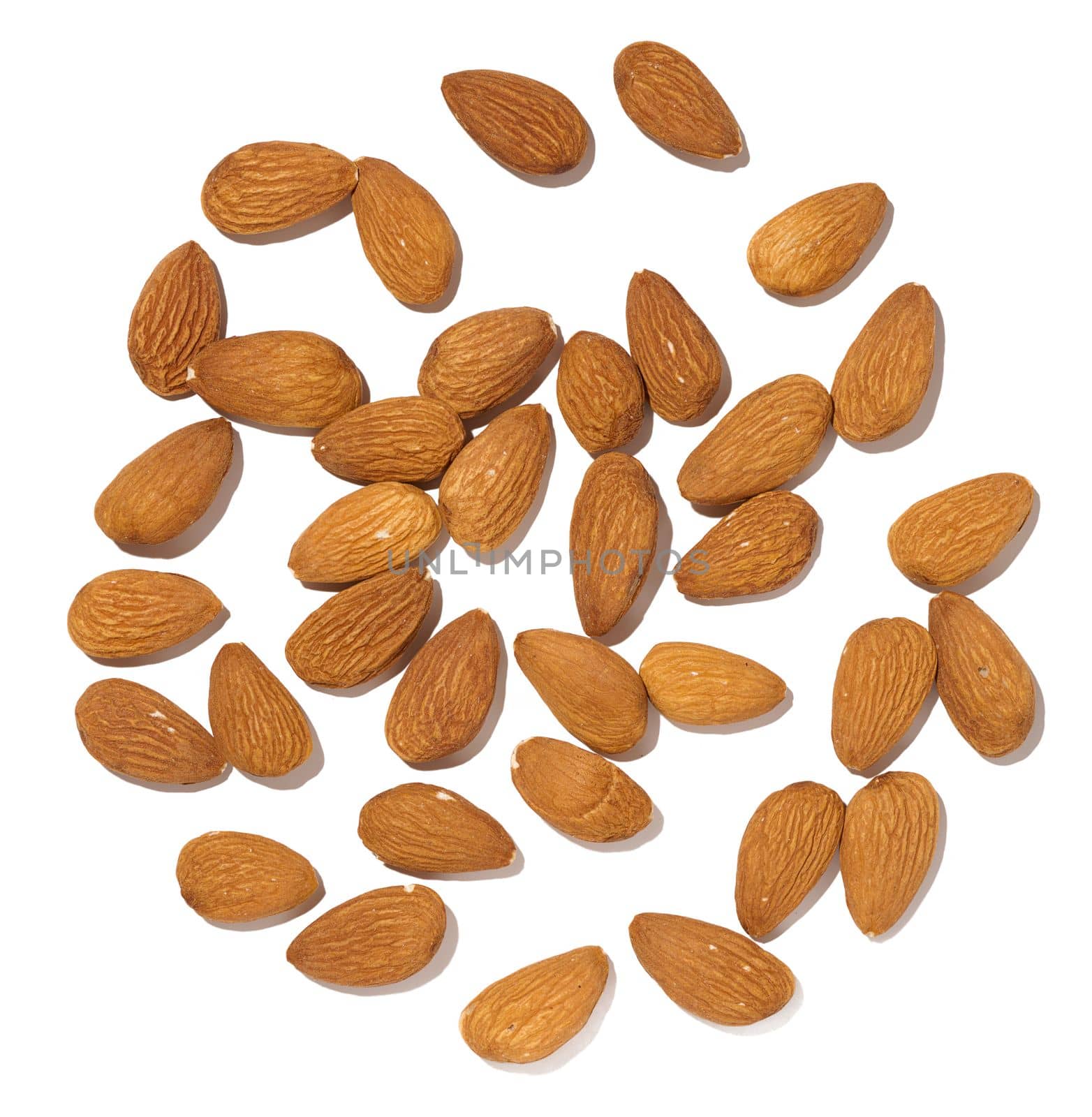 Almond kernel on a white isolated background, top view