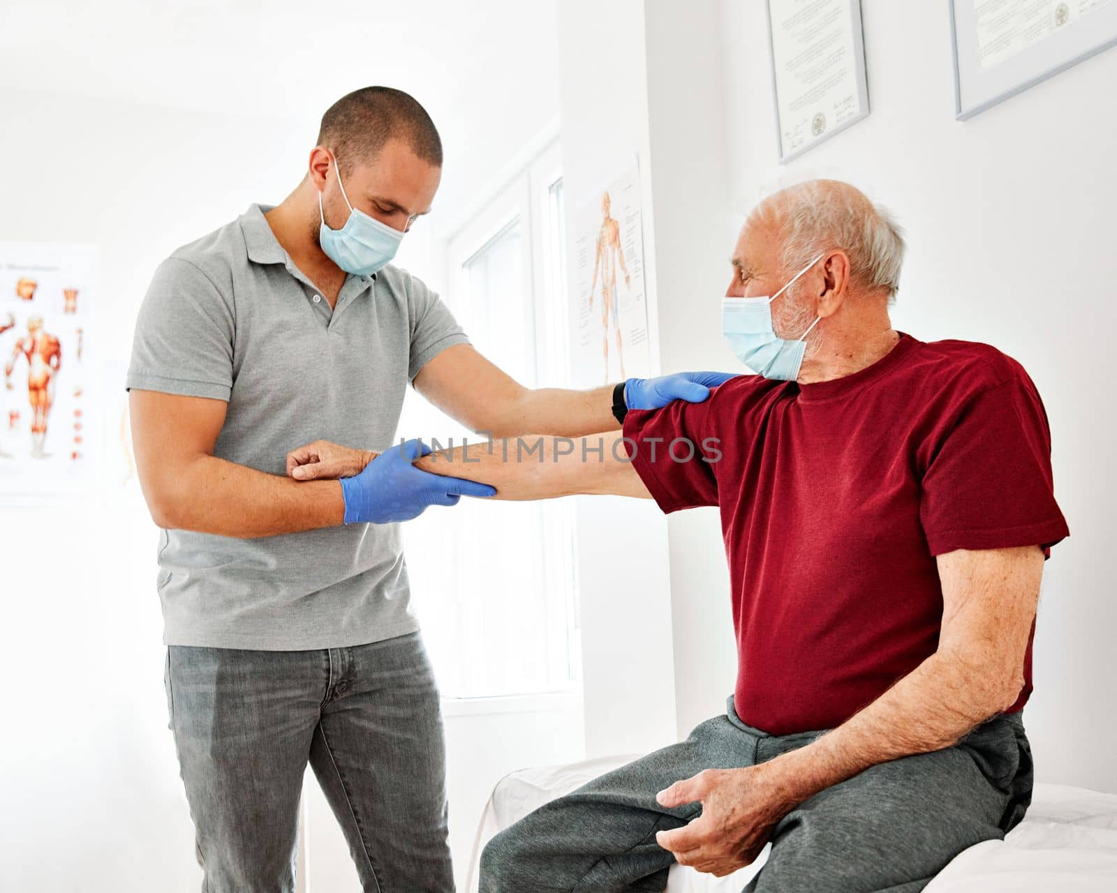 nurse doctor senior care exercise physical therapy exercising help assistence retirement home physiotherapy strech band clinic therapist elderly man stretching by Picsfive
