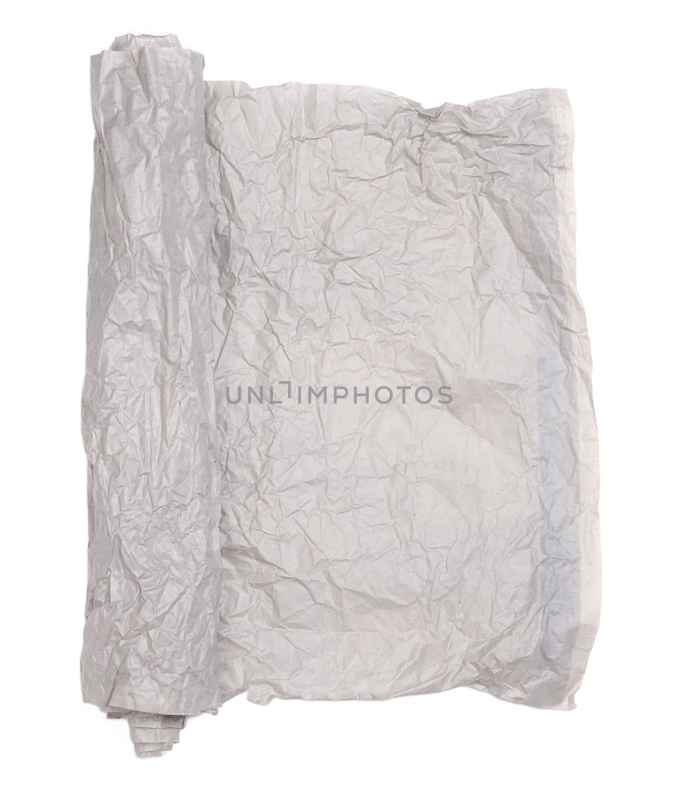 Roll of gray crumpled paper isolated on white background by ndanko