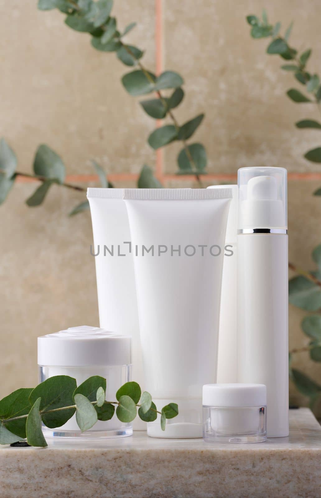 White plastic tube, jar for cosmetics. Container for gel, cream, tonic. Advertising and product promotion