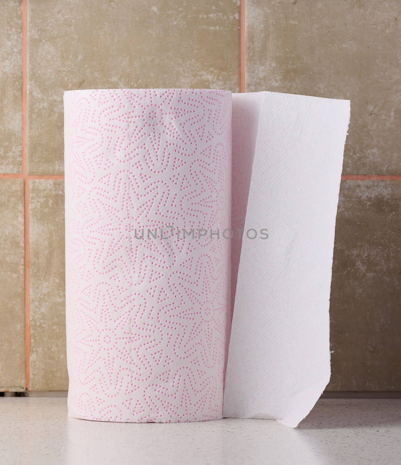 Soft white paper towel on a white table, disposable kitchen towel by ndanko