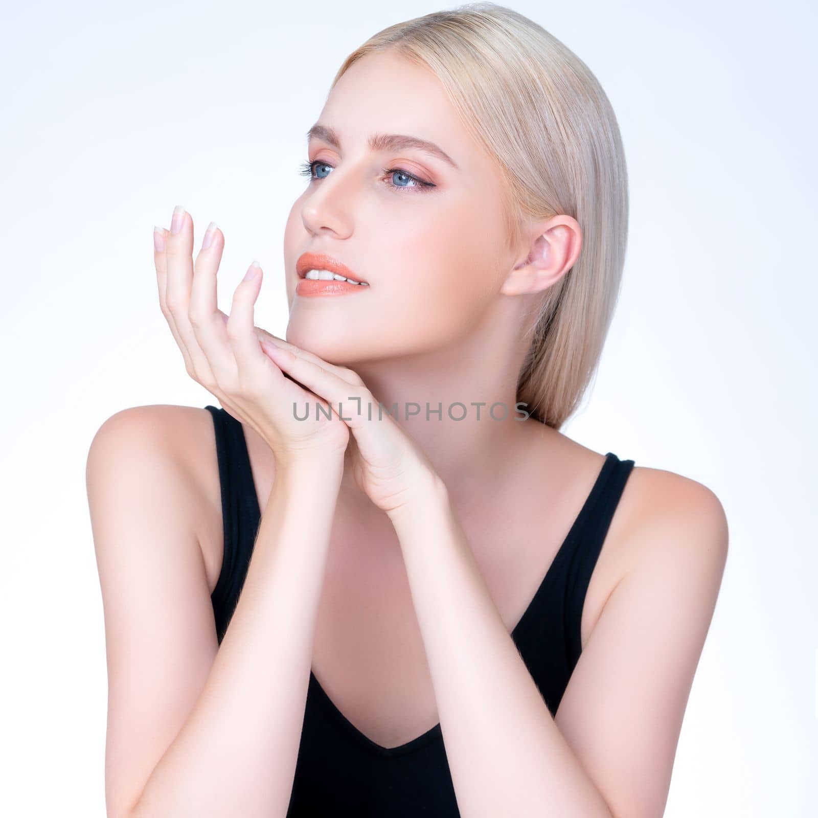 Closeup personable beautiful woman portrait with perfect smooth clean skin and natural makeup portrait in isolated background. Hand gesture with expressive facial expression for beauty model concept.