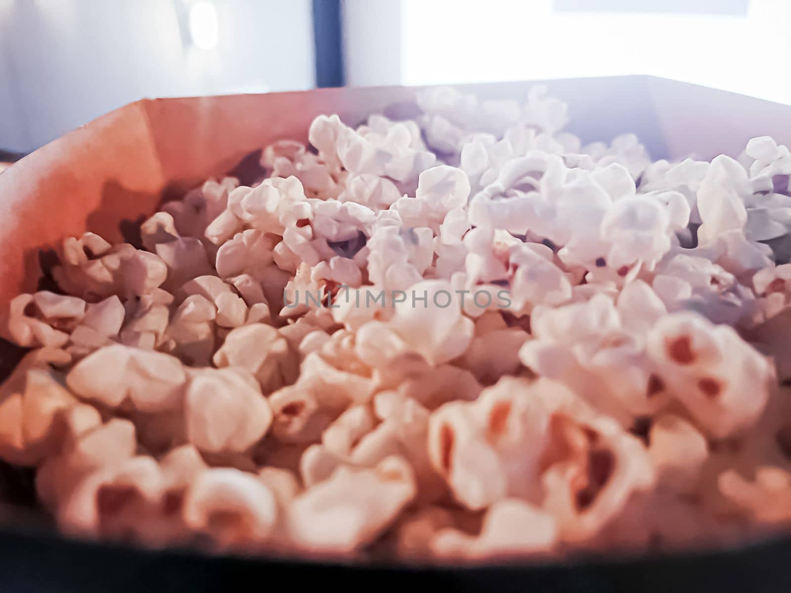 Cinema and entertainment, popcorn box in the movie theatre for tv show streaming service and film industry production branding
