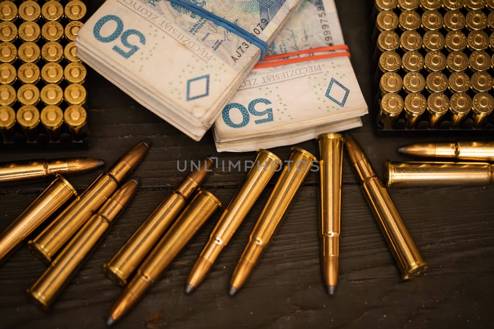 During the sale, ammunition and money lie on the same table. Trade in ammunition for small arms and long guns. Necessary accessories during the war.