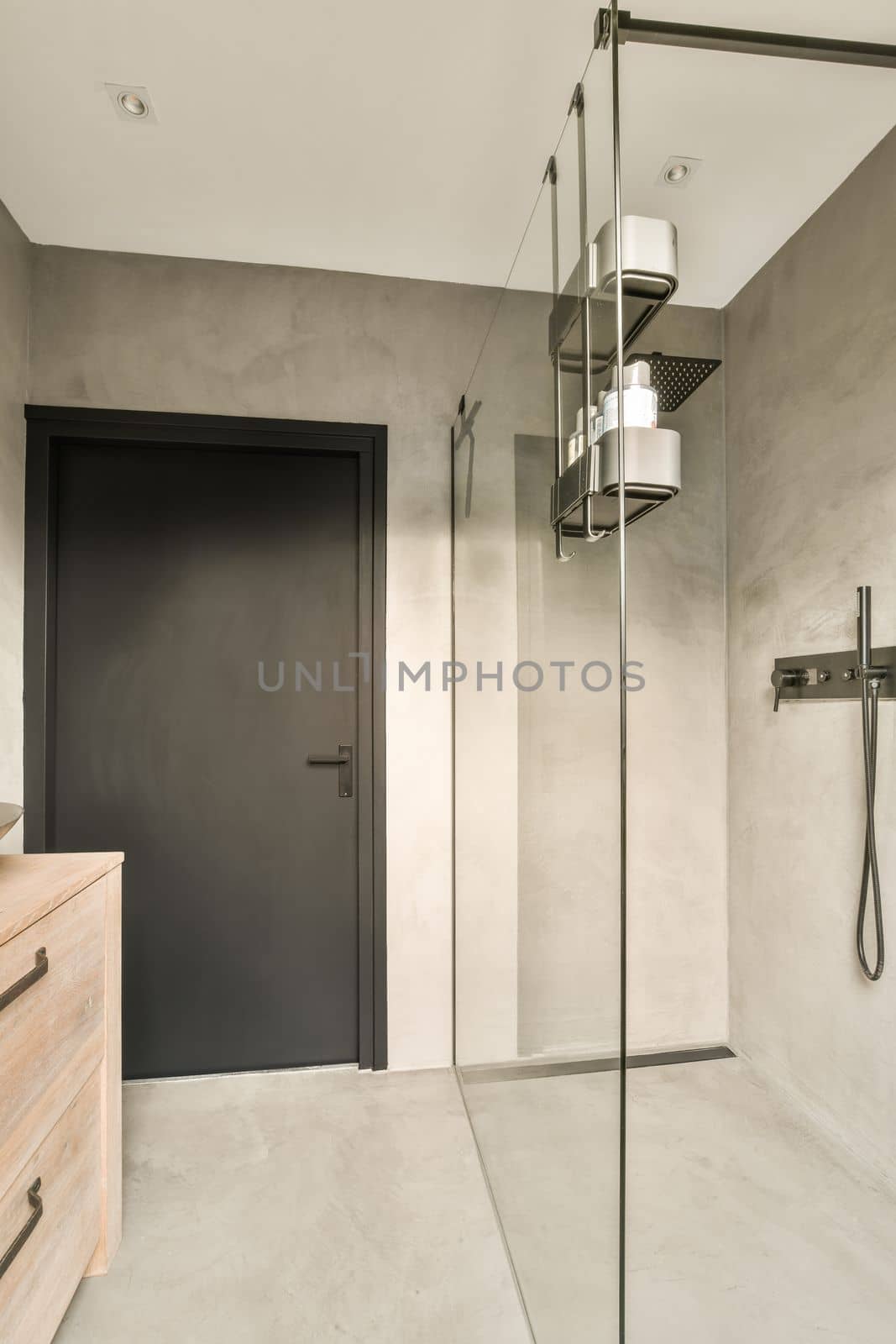 a bathroom that is very clean and ready to be used as a walk - in shower or wet room for use