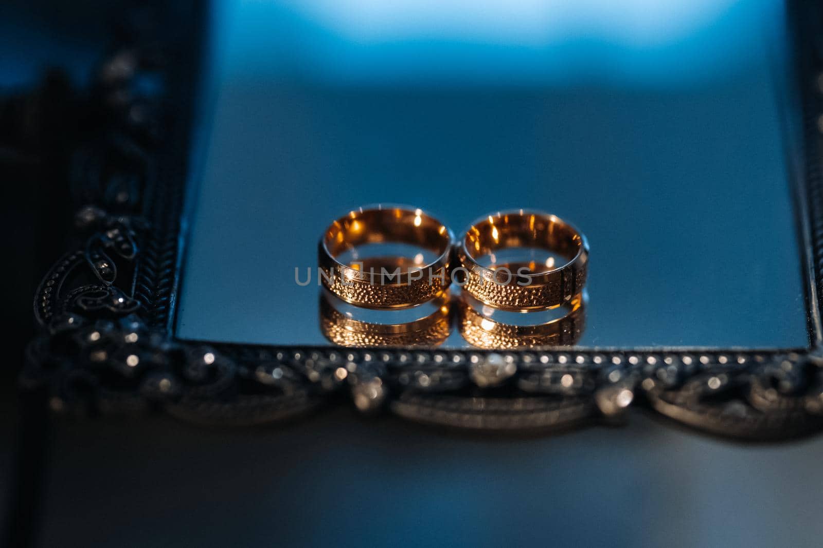 Close-up of two gold wedding rings for a wedding.