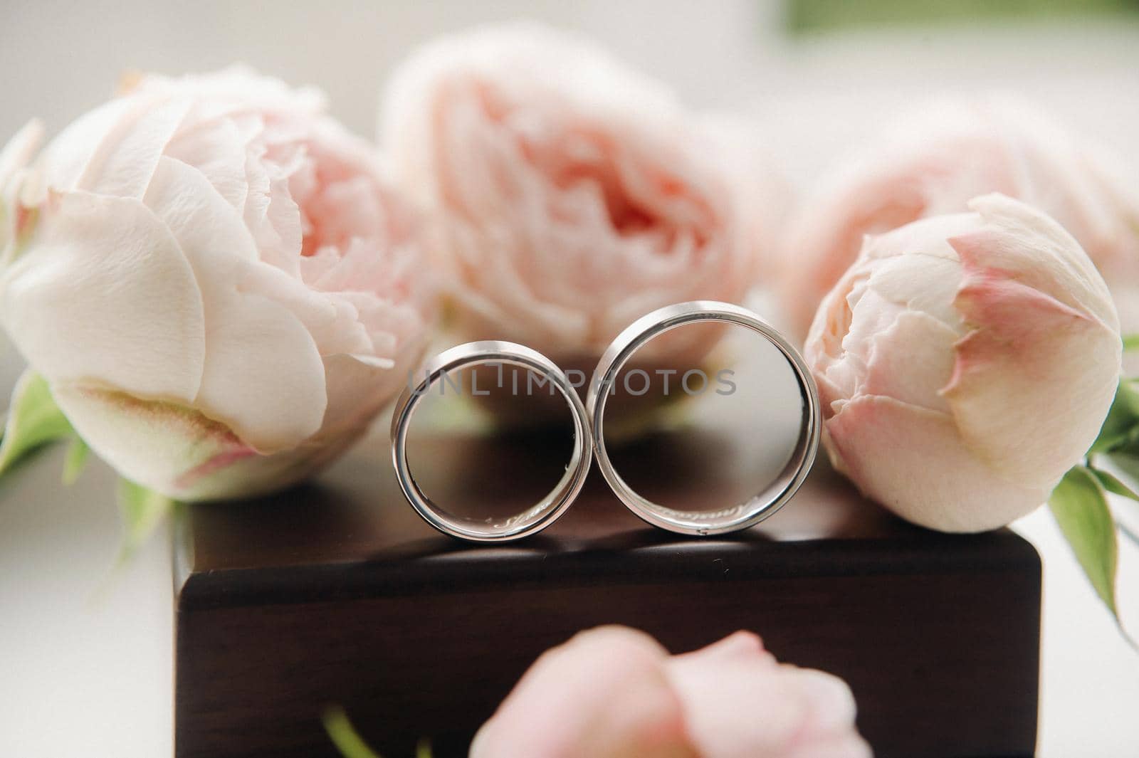 Close-up of two gold wedding rings for a wedding.