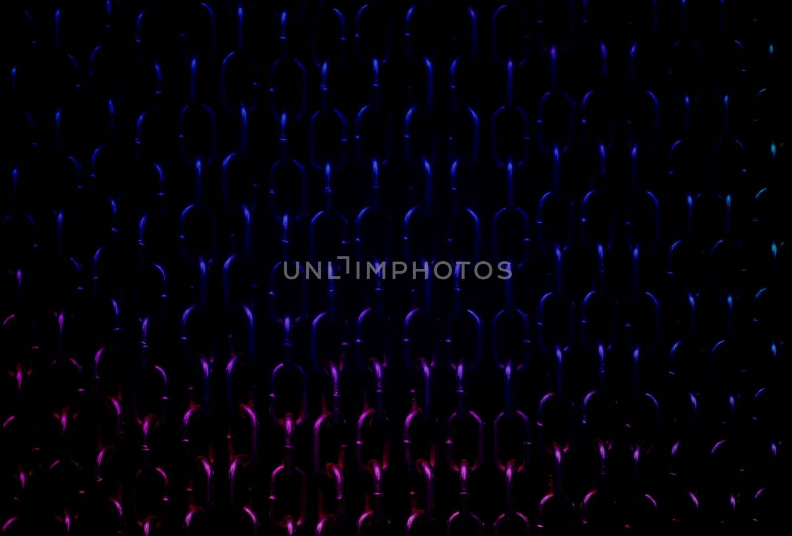 Rusty chains isolated on black background in neon backlighting. Background of chains on a black background. Rust Anchor Chain. Curtain of old chain-link. Background of metal chains, old used chain.