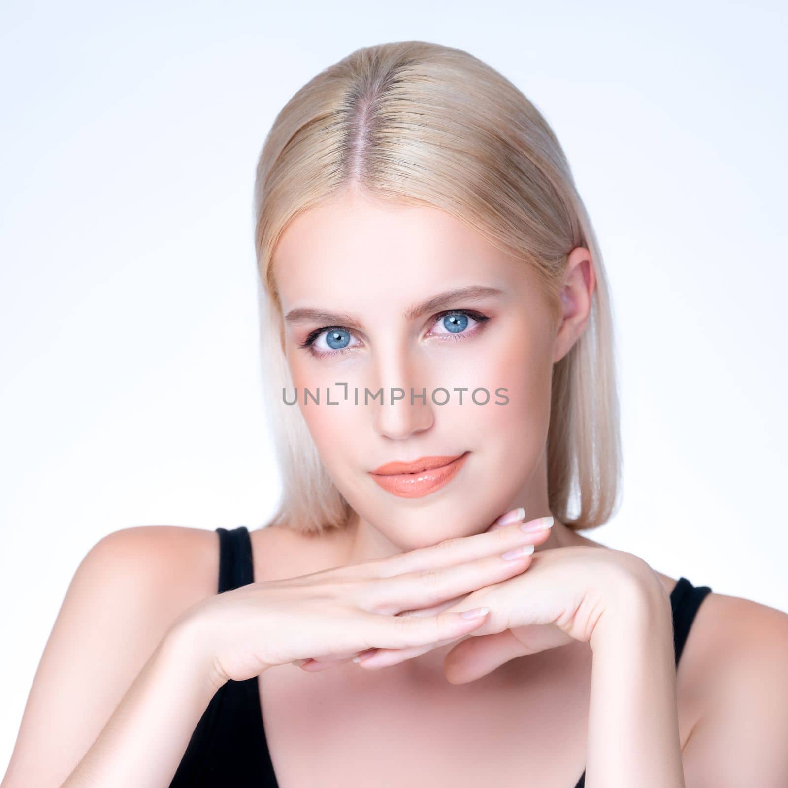 Closeup personable beautiful woman portrait with perfect smooth clean skin and natural makeup portrait in isolated background. Hand gesture with expressive facial expression for beauty model concept.