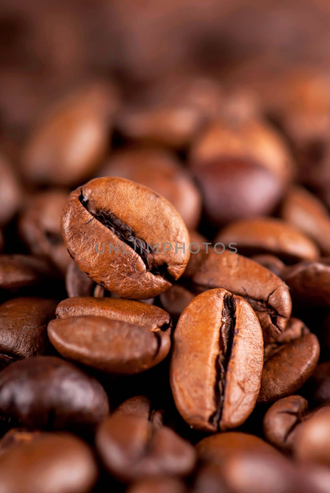 Closeup of coffee beans with focus