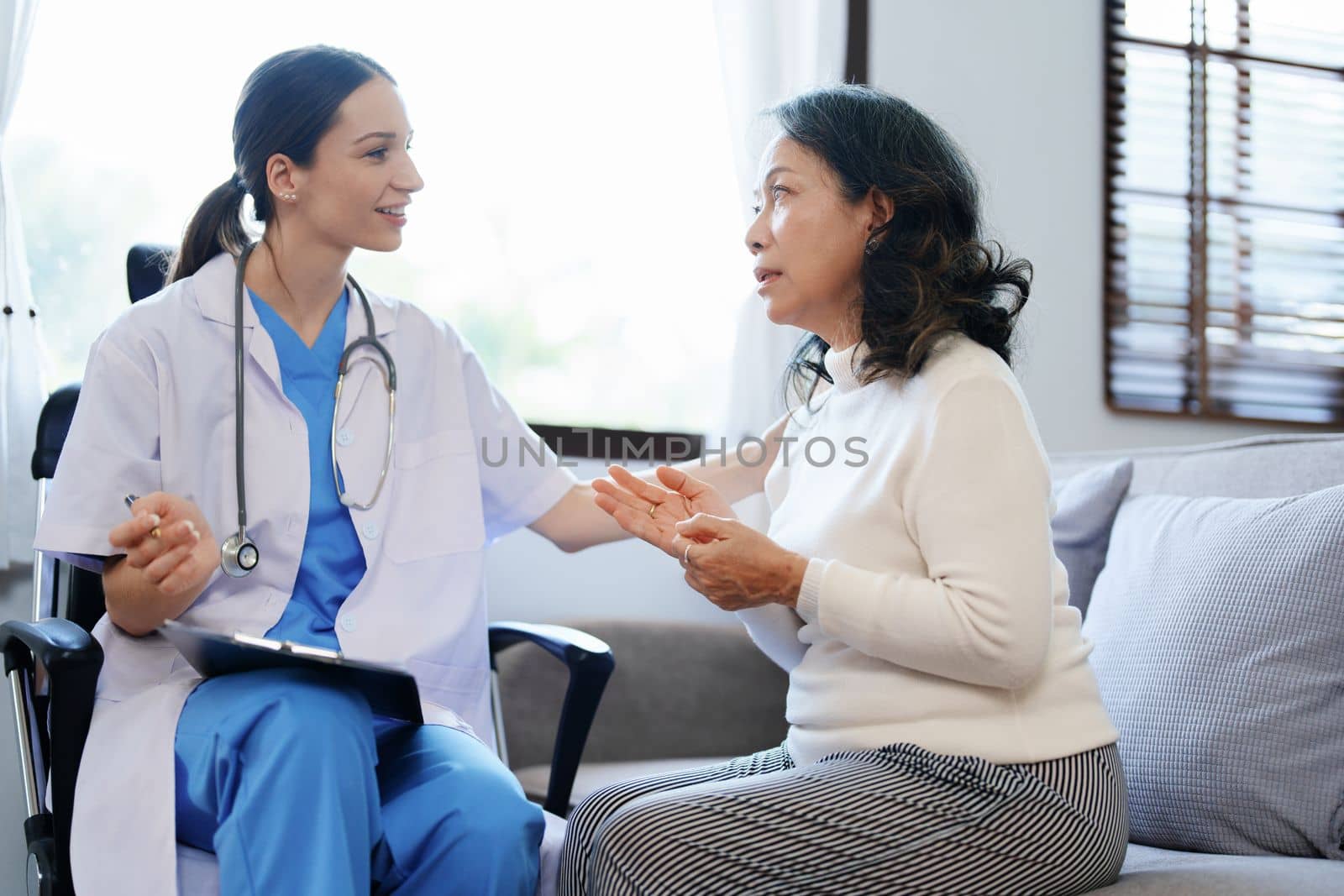 Portrait of a female doctor holding clipboard documents to discuss and analyze the patient's condition before treating