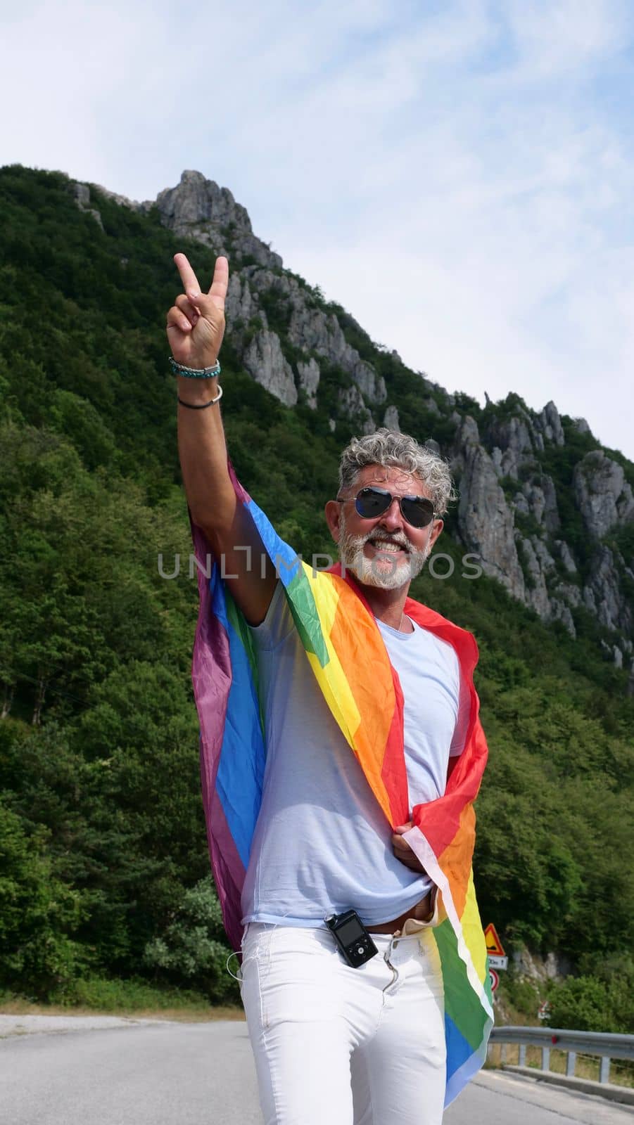 Senior man Gay gray-haired with LGBT flag by OksanaFedorchuk