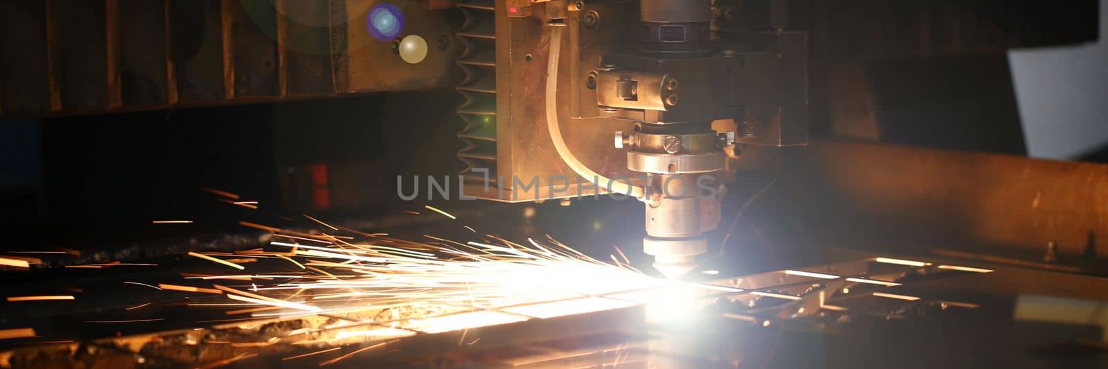 CNC Laser cutting of metal and modern industrial technologies. Metalworking and plasma cutting machines