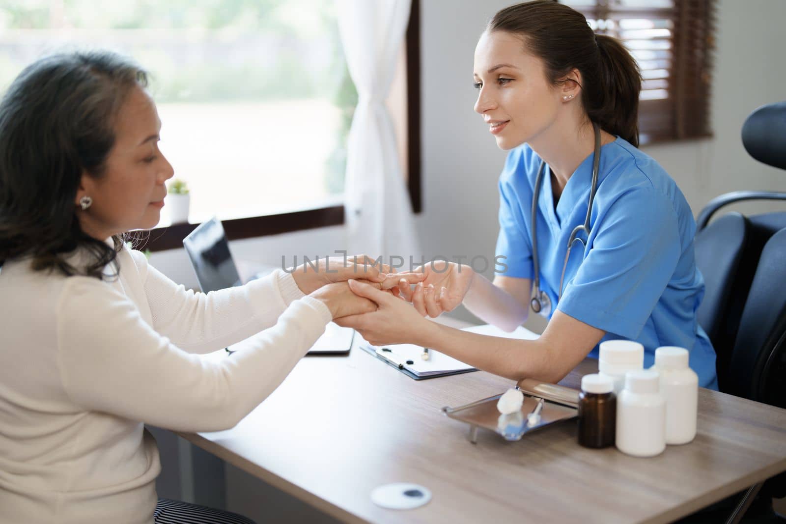 Portrait of a female doctor holding a patient clipboard to discuss and analyze wrist and finger pain