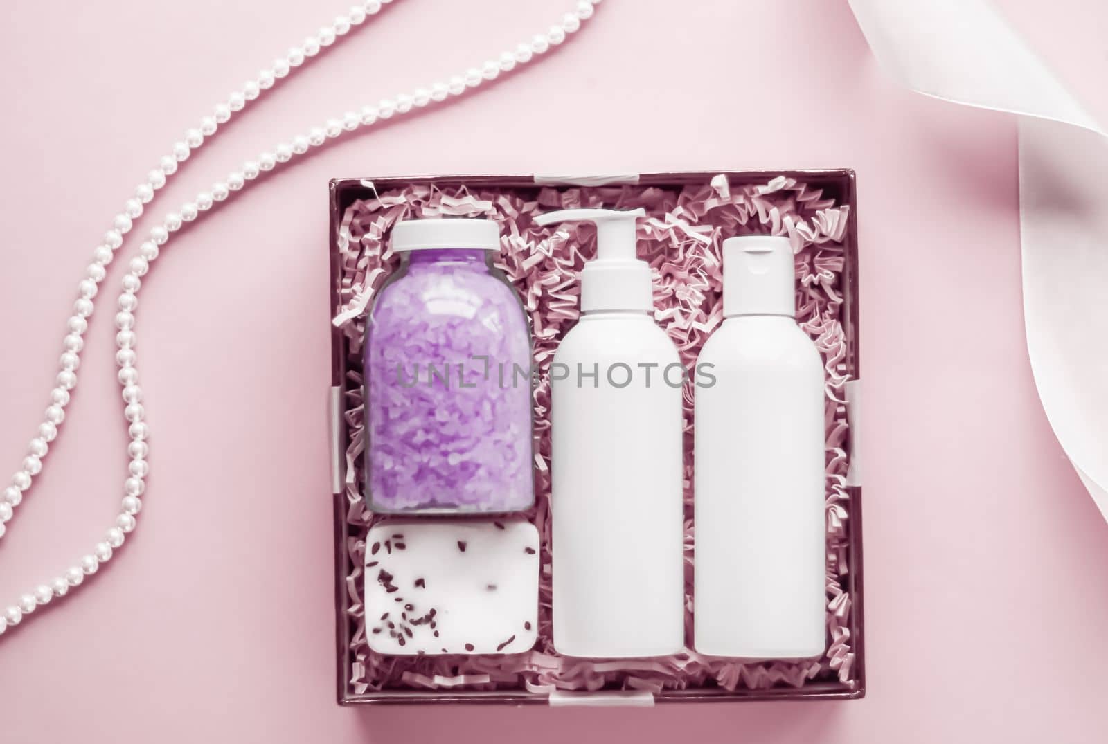 Beauty box subscription package, luxury skincare and body care products, milk lotion, bath salt, soap, shower gel as flat lay on pink background, spa cosmetics as holiday gift, online shopping delivery, flatlay by Anneleven