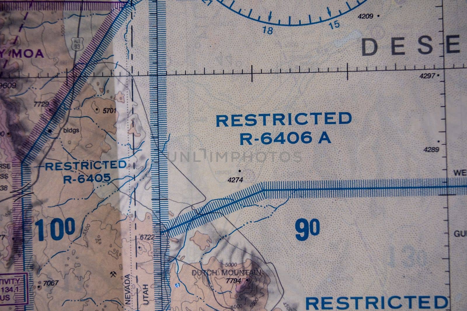 Close up detail of FAA sectional map showing restricted airspace national security flight regulations. High quality photo