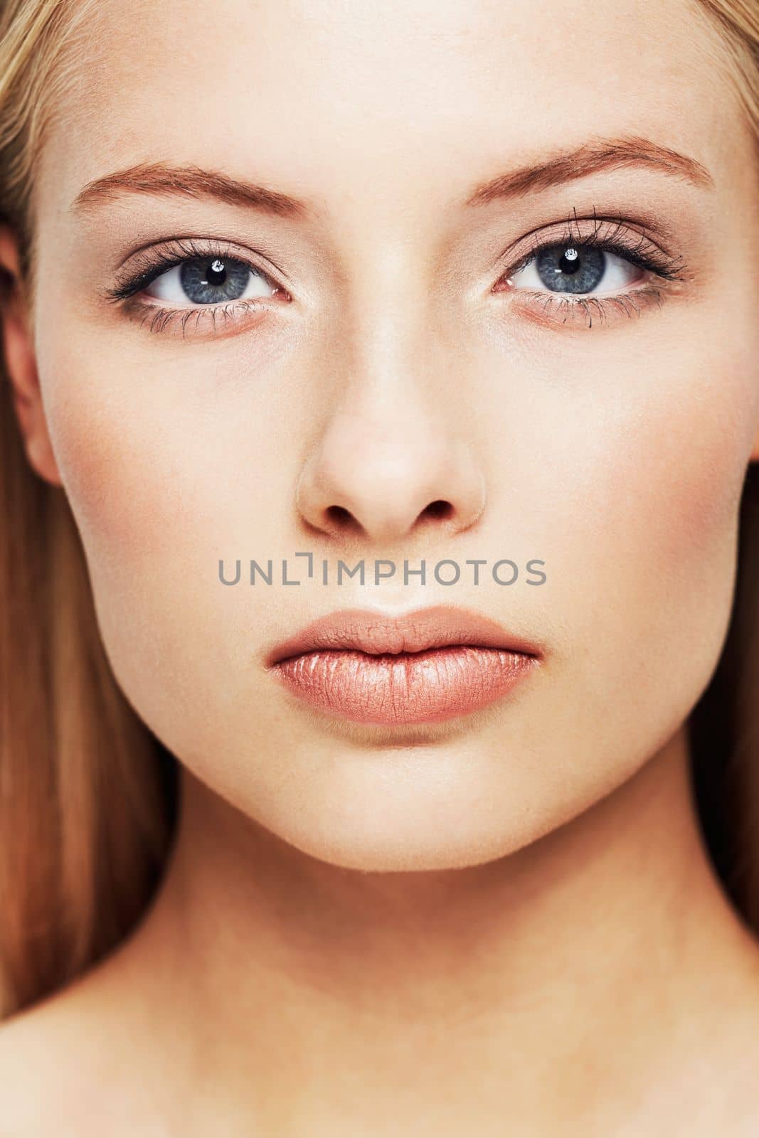 Her beauty is all natural. Portrait of a beautiful young woman in the studio