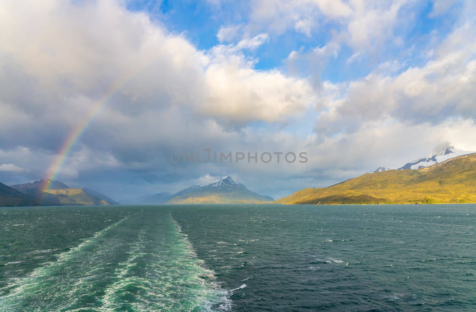 Panorama of Glacier Alley of Beagle channel in Chile from cruise ship with rainbow