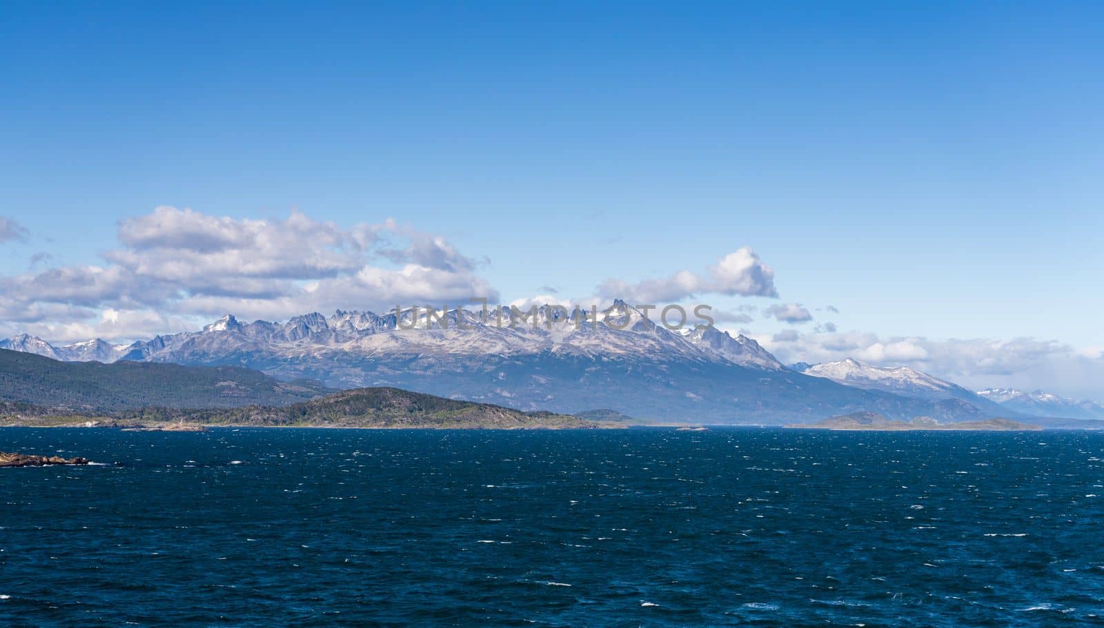 Range of mountains on the island opposite city of Ushuaia in Argentina on Beagle Channel