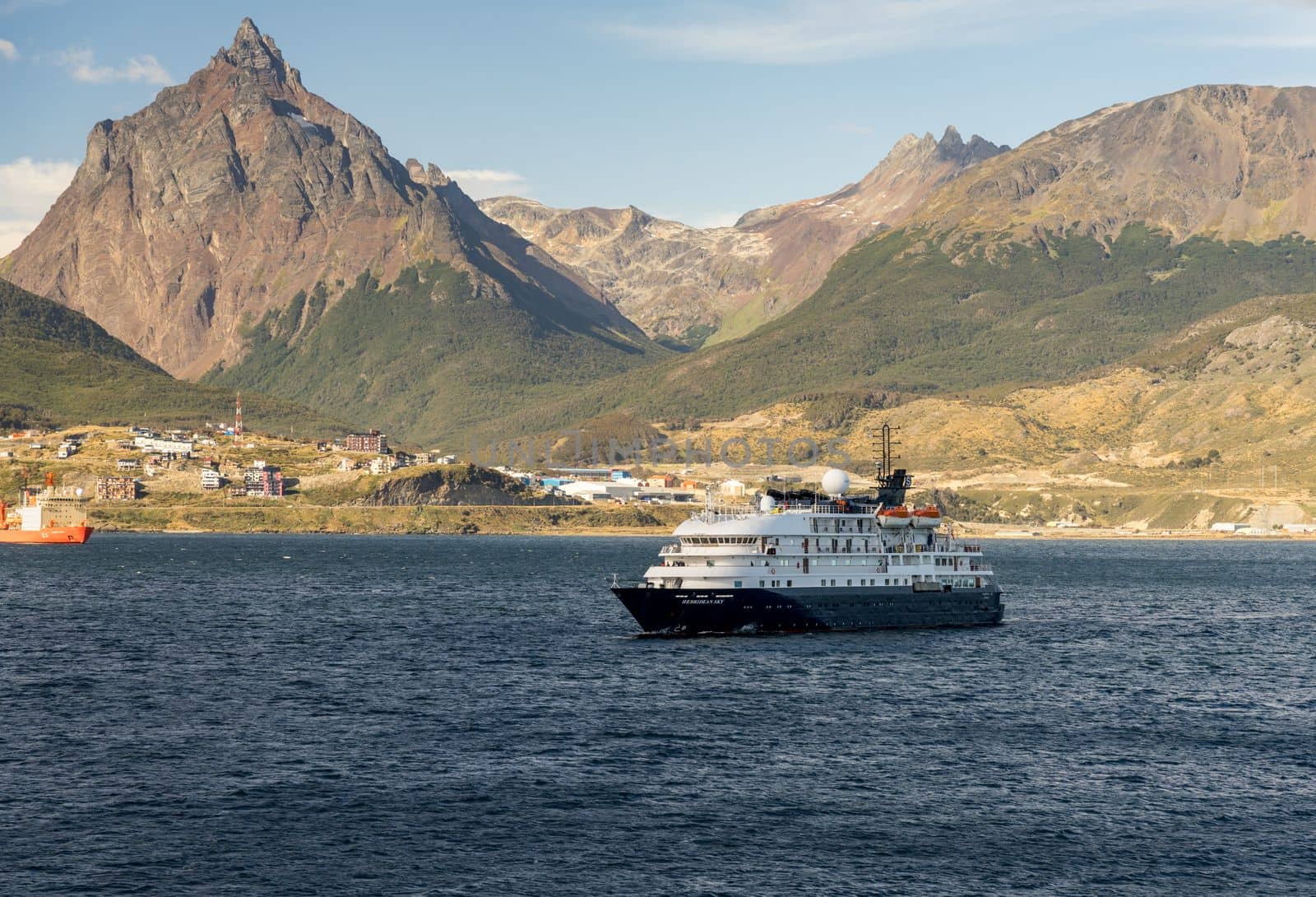 Ushuaia, Argentina - 28 January 2023: Hebridean Sky expedition cruise ship at anchor in bay